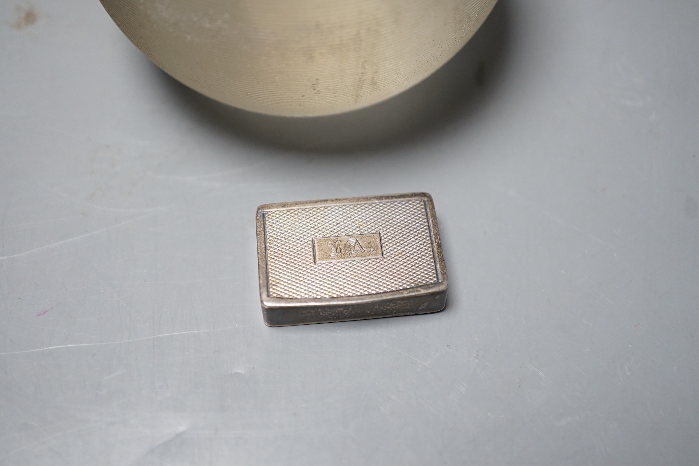 A George V silver mounted ribbed glass match strike, height 75mm and a late Victorian silver pill box.